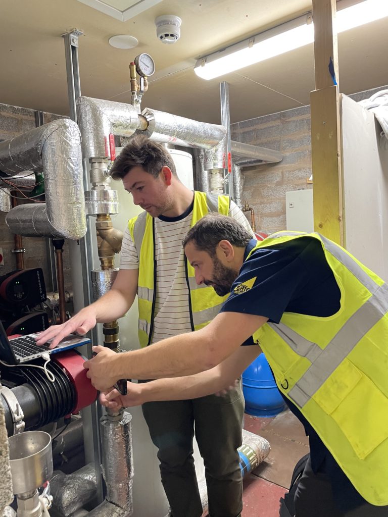 Chirpy Heat's Technical Team reviewing a plantroom